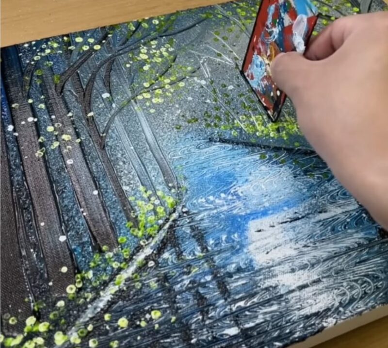 La technique du peigne humain pour peindre une magnifique scène de « jour de pluie » remporte 2,6 millions de vues